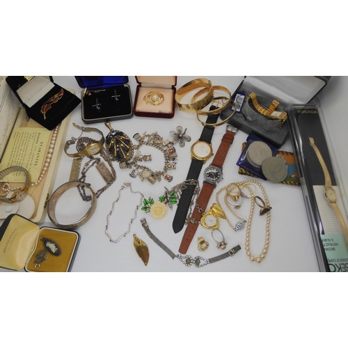 756 - Two silver ingot pendants, three vintage rolled gold bangles, a silver bangle and other items