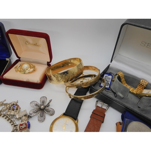 756 - Two silver ingot pendants, three vintage rolled gold bangles, a silver bangle and other items