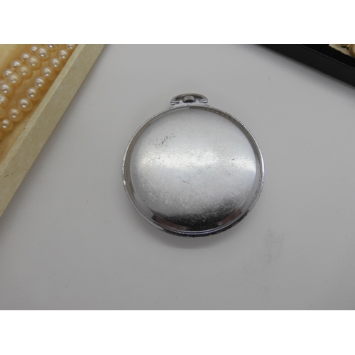 760 - A chromed Marvin pocket watch, and faux pearls