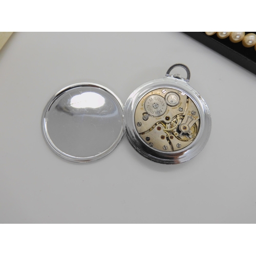 760 - A chromed Marvin pocket watch, and faux pearls