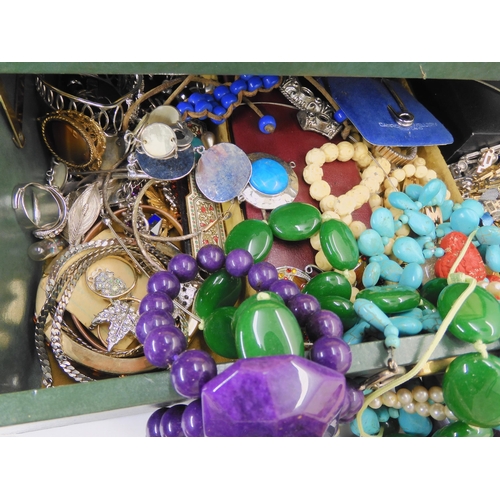 761 - A large collection of vintage costume jewellery, an evening bag and other items