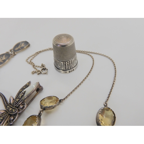 764 - A silver mounted citrine necklace, largest citrine 18mm x 14mm, a Robert Allison sword brooch, an ag... 