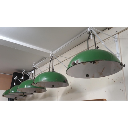 81 - A lot of five Revo green and white enamel industrial ceiling shades and a 20th century light control... 