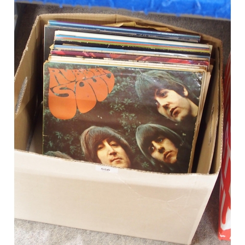 556 - A lot of vinyl LP records with Beatles, Rolling Stones, Rod Stewart, Simply Red etc together with 78... 