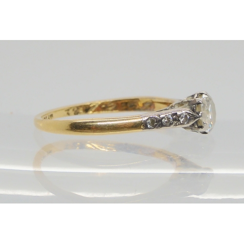 617 - An 18ct and platinum diamond solitaire ring set with an estimate approx 0.35ct diamond with diamond ... 