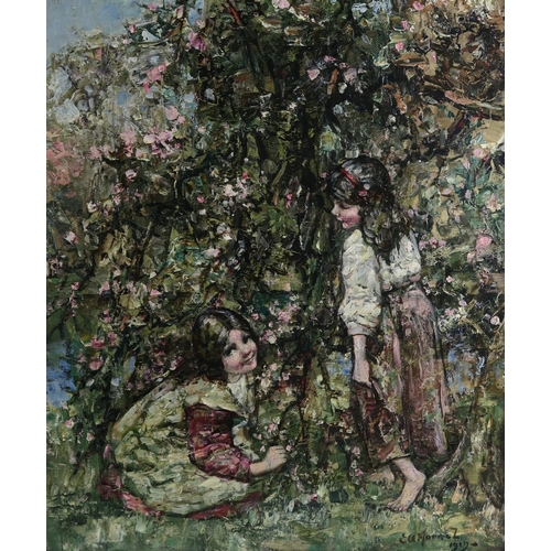 899 - EDWARD ATKINSON HORNEL (SCOTTISH 1864-1933)PICKING BLOSSOM Oil on canvas, signed lower right, dated ... 