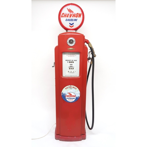 520 - AUTOMOBILIA An American Bennet petrol pump with hose and brass nozzle, bearing Chevron Gasoline adve... 