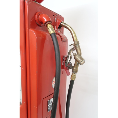 520 - AUTOMOBILIA An American Bennet petrol pump with hose and brass nozzle, bearing Chevron Gasoline adve... 