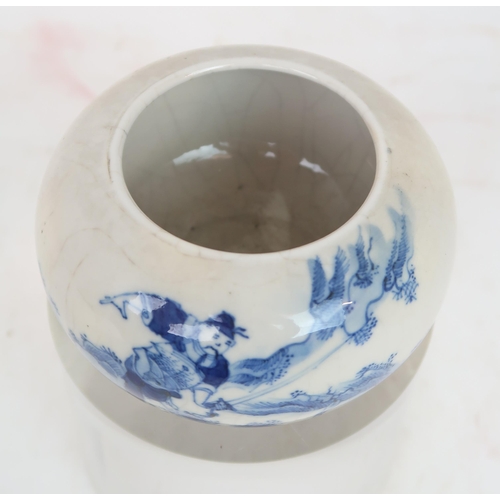 315A - A CHINESE BLUE AND WHITE CRACKLEWARE BOWLpainted with a figure confronting a snake, six character ma... 