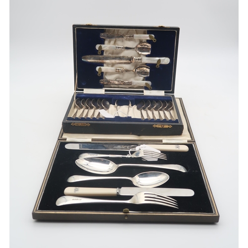 451 - A cased set of silver and stainless steel cutlery, comprising two trios of knives, forks and spoons,... 