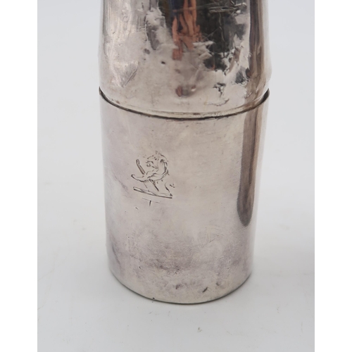 454 - Two EPNS drinks flasks modelled as slender bottles, one with engraved crest to detachable beaker (2)