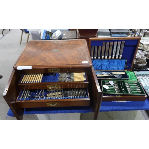 457 - A mahogany four drawer canteen of silver plated cutlery, some knives silver collared, spoons and for... 