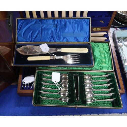 457 - A mahogany four drawer canteen of silver plated cutlery, some knives silver collared, spoons and for... 