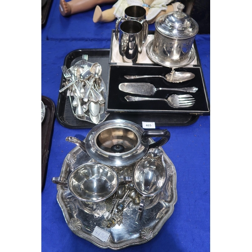 465 - A collection of EPNS including a three piece tea service, souvenir spoons, a shaped tray with engrav... 