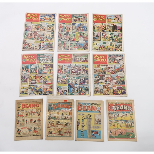 506 - A large collection of assorted annuals and novels including 14 Mickey Mouse Weekly issues 1939, 1953... 