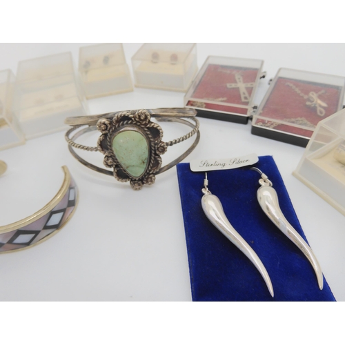 892 - A white metal First Nation turquoise bangle and a collection of silver and costume jewellery