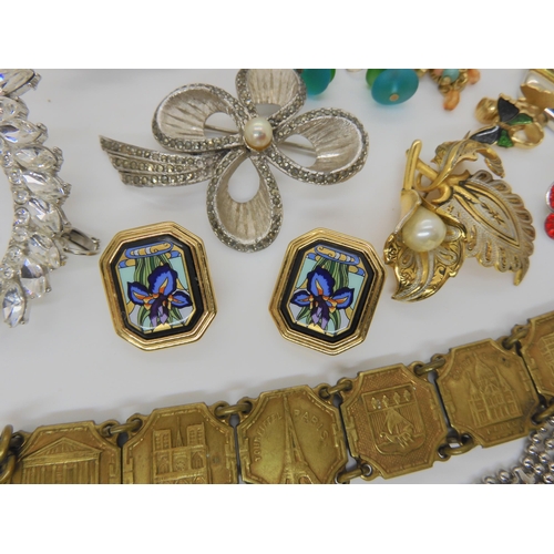 900 - A pair of Michaela Frey enamelled earrings, items by Napier, Sphinx and Avon etc