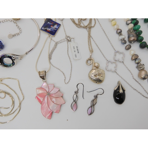 901 - A quantity of silver and white metal jewellery to include a vintage Ward Brothers leaf brooch, cultu... 