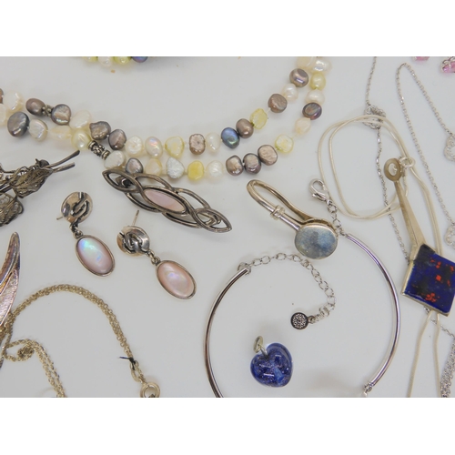 901 - A quantity of silver and white metal jewellery to include a vintage Ward Brothers leaf brooch, cultu... 