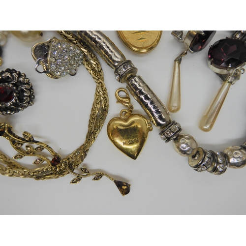 902 - A Swarovski bracelet, a pendant and earring set by Napier, a carded Miracle brooch and other items