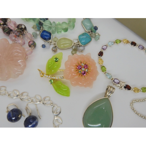 903 - A Joan Rivers flower brooch, a silver mixed gemstone bracelet, a fluorite bead bracelet and other it... 