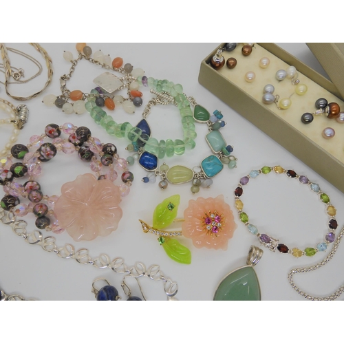 903 - A Joan Rivers flower brooch, a silver mixed gemstone bracelet, a fluorite bead bracelet and other it... 