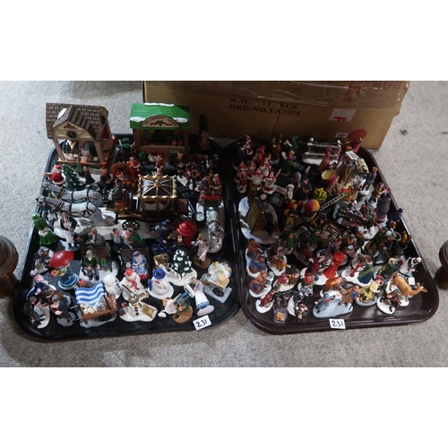 231 - A collection of Lemax Christmas figures, bristle trees, backdrop and two moulded plastic landscape p... 