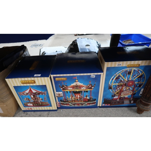 232 - Lemax Christmas village models including Grand Carousel, Santa Carousel and The Giant Wheel