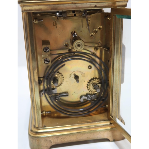 279 - A small desk clock, the dial marked E Dreyfous, with roman numerals and in gilt metal mount together... 