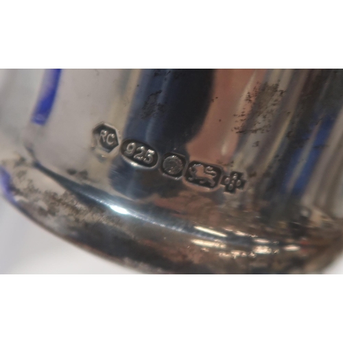 281 - A blue flashed and cut glass decanter with silver neck and collar, together with a millennium silver... 