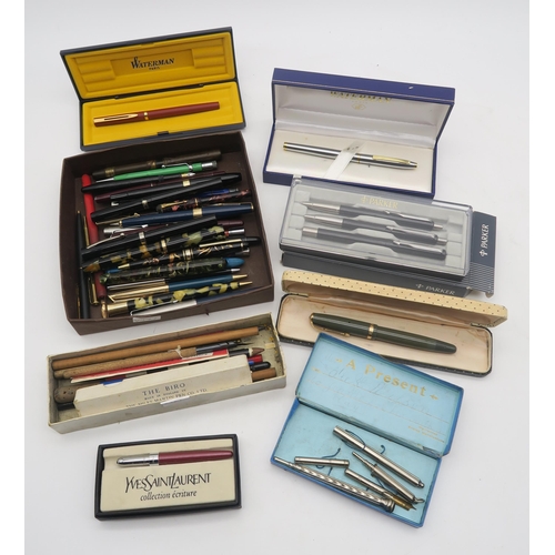 553 - A large collection of pens, with examples by Parker, Waterman, Sheaffer, Cross etc.