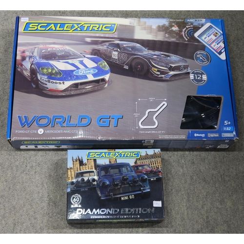 642 - A Scalextric World GT set and a Mini 60 Diamond Edition set of three cars