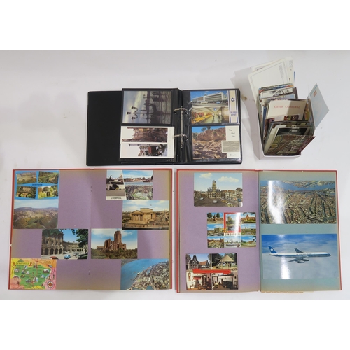 645 - A three albums of late-20th century postcards, with assorted loose postcards