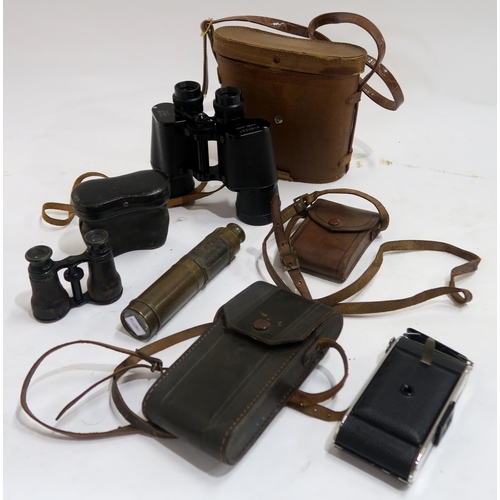 647 - A brass three-draw telescope, Victorian opera glasses in leather case, binoculars by Everest and an ... 