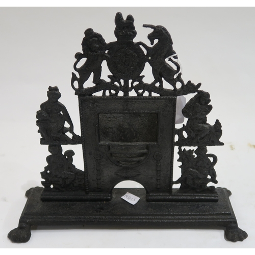 648 - A mixed lot to include a cast iron miniature fireplace surmounted by a Royal Coat of Arms, a plate f... 