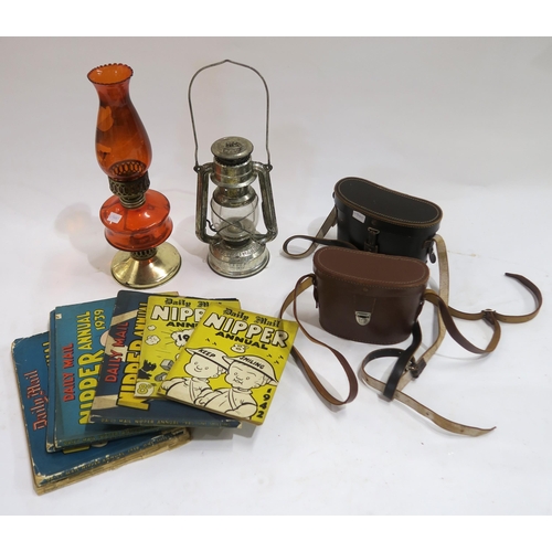 649B - Two cased pairs of binoculars, a collection of 1030s/40s Daily Mail Nipper annuals, a coloured glass... 