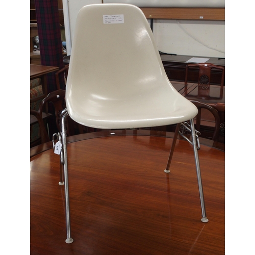 128 - A circa 1950 Eames for Herman Miller moulded fibreglass stacking chair