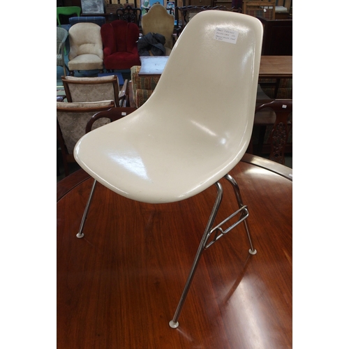 128 - A circa 1950 Eames for Herman Miller moulded fibreglass stacking chair