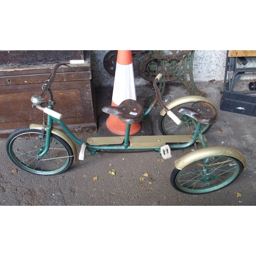 135A - A 20th century child's tandem tricycle