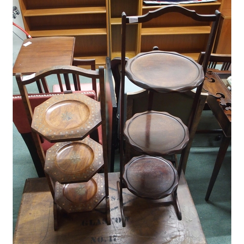 192 - A two 20th century mahogany three tier collapsing cake stands (2)