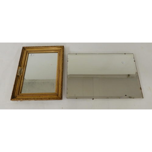 29 - A 20th century bevelled glass frameless wall mirror and another gilt framed wall mirror (2)