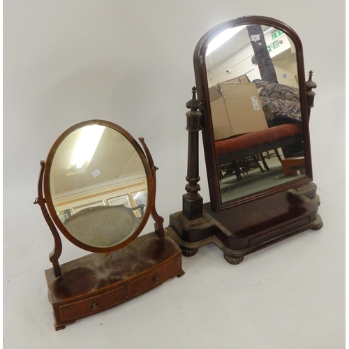 31 - A large Victorian mahogany framed single drawer toilet mirror, a smaller two drawer dressing mirror ... 