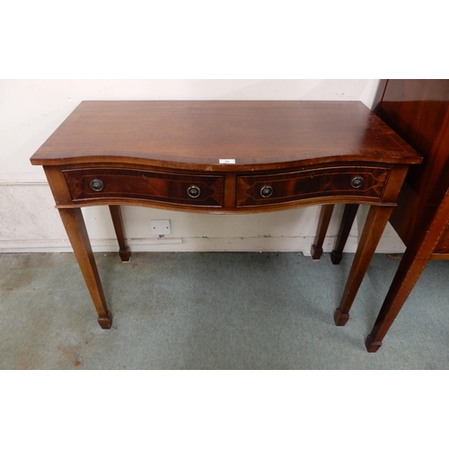 39 - A late Victorian mahogany serpentine front sideboard and a two drawer buffet table (2)