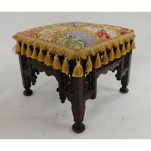 42 - An eastern footstool in the manner of Liberty & Co 