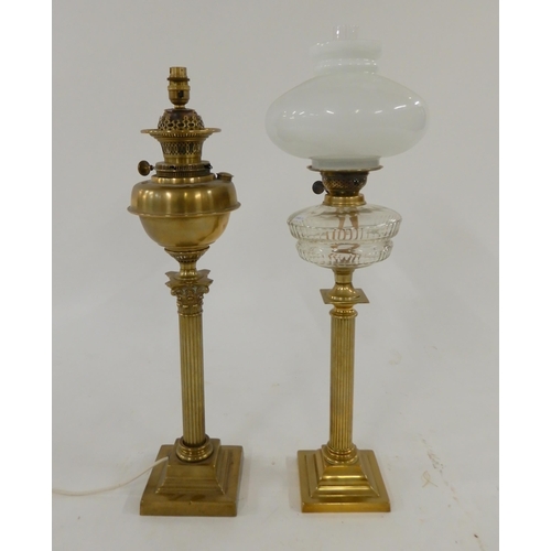 44 - A Victorian brass oil lamp and a brass oil lamp converted to electric (2)