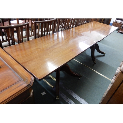 50 - A pair of 19th century mahogany tables on quadrupedal bases (2)