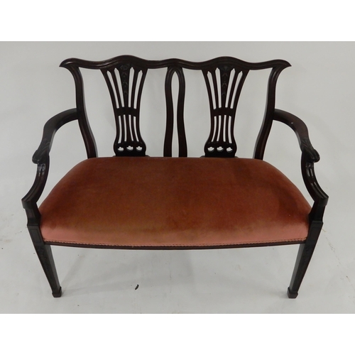 59 - A late Victorian mahogany framed two seater parlour settee