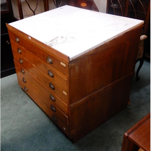 74 - A 20th century oak six drawer plan chest with sloped top