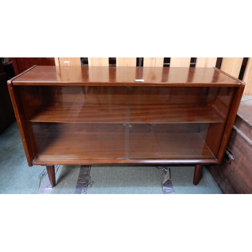 77 - A mid 20th century teak bookcase with glass sliding doors and a mahogany standard lamp (2)