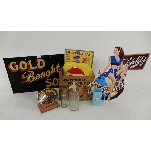 80 - A mixed lot to include Schlitz beer advertising, Pepsi cola sign, John Smith's pump stand, Johnnie W... 